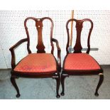 A set of eight Queen Anne style mahogany vase back dining chairs on tapering pad feet, (8).