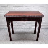 A George III mahogany rectangular mahogany concertina action card table in the Chinese Chippendale