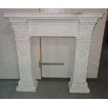 A 20th century white painted fire surround with floral and egg and dart decoration,