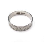 A platinum wide band wedding ring, with engraved decoration, detailed PLATINUM,