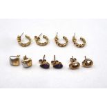 A pair of gold earstuds, each in a pierced openwork design, a pair of 9ct two colour gold earstuds,