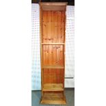 A 20th century tall pine bookcase 55cm wide x 224cm high.