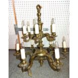 A Regency style twelve branch brass chandelier, 80cm wide x 82cm high.