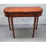 A late George III inlaid mahogany 'D' shaped card table, on tapering square supports,