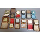 A quantity of late 20th century portable alarm clocks, mostly in folding cases, (qty).