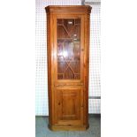 A 20th century pine floor standing corner display cabinet/ cupboard,