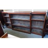 A 19th century oak floor standing breakfront open bookcase on a plinth base,