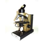 A 20th century Vickers electric microscope.