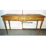 A Louis XVI style gold painted breakfront console table on reeded tapering supports,