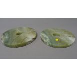 Two Chinese jade bi discs, of thick proportions,