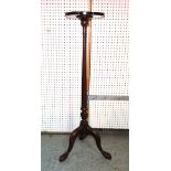 A late George III mahogany tripod table with fluted tapering column on later added ball and claw