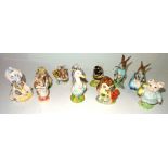 Beatrix Potter; a group of eleven Royal Albert figurines, including Babitty bumble, Foxy gentleman,