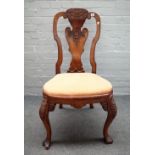 A George I provincial oak framed vase back dining chair,