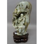 A Chinese mottled jade boulder carving, 18th/19th century,