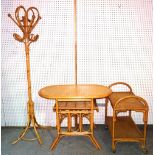 A 20th century bamboo suite comprising an oval centre table, 78cm wide x 75cm high,