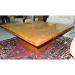 A 20th century hardwood square coffee table on plinth base, 100cm wide x 38cm high.