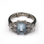 An 18ct white gold, aquamarine and diamond ring,
