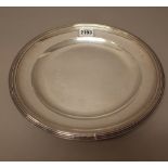 A French main course plate, of circular form with a decorated rim, the underside monogram engraved,