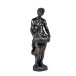 An early 20th century terracotta figure,