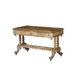 A Victorian carved light oak two drawer centre table on barleytwist columns and four scrolled
