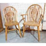 A set of eight 20th century beech framed wheelback dining chairs, on turned supports,