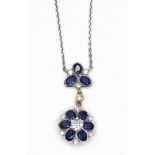 A sapphire and diamond, yellow and white gold necklace,