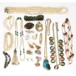 A collection of costume jewellery, including; a peach gemset necklace,