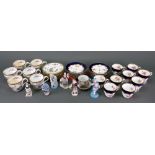 A set of nine Coalport coffee cups and thirteen saucers,