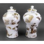 A pair of decalcomania glass vases and covers, 19th century, of baluster form,