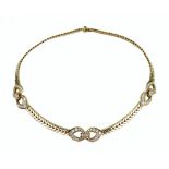 Cartier, Paris; an 18ct gold and diamond collar necklace,
