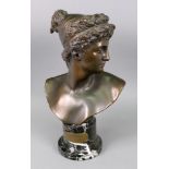 A bronzed bust of Atalanta after F J Williamson, with verde antico marble socle,