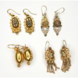 A quantity of Revival style earrings, comprising: a pair with filigree detailing,
