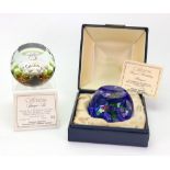 Two Caithness glass paperweights, Shangri-La No 54/150 and Royal Birthday Bouquet No.