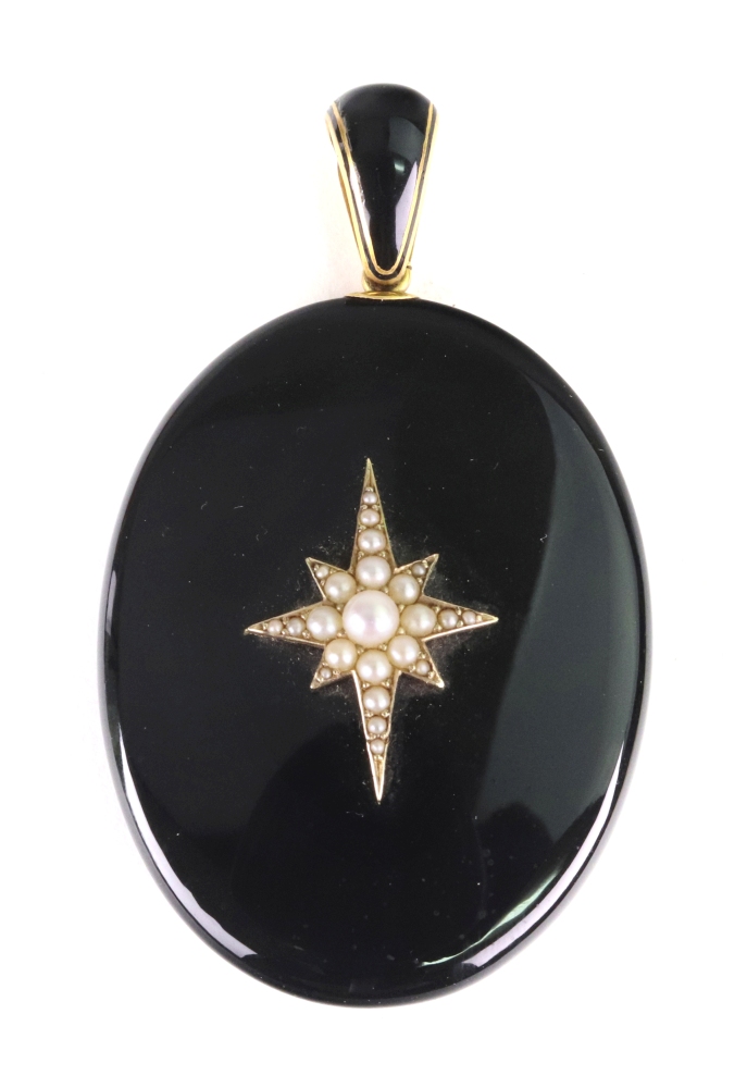A gold, onyx and seed pearl locket,