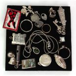 A collection of charms including a whistle, detailed '925', a silver pendant and others (qty).