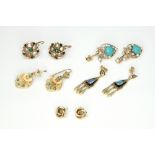A quantity of earrings, comprising: a pair of mother of pearl and green gemstones,