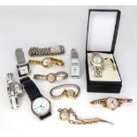 A collection of eleven ladies quartz wristwatches including Nivia, Pulsar,