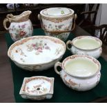 A Powell, Bishop & Storier 8-piece oriental ivory toilet set, floral transfer,