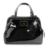A Lulu Guinness black patent leather han