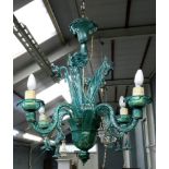 An Italian green glass four-light chande