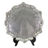 A George II style shaped circular silver