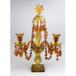 A amber glass candelabrum, late 19th/ear