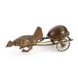 A novelty gilt metal inkwell, late 19th century, probably French, in the form of an egg,