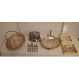 Two silver Armada style dishes (one presentation inscribed and crest engraved), both London 1976,