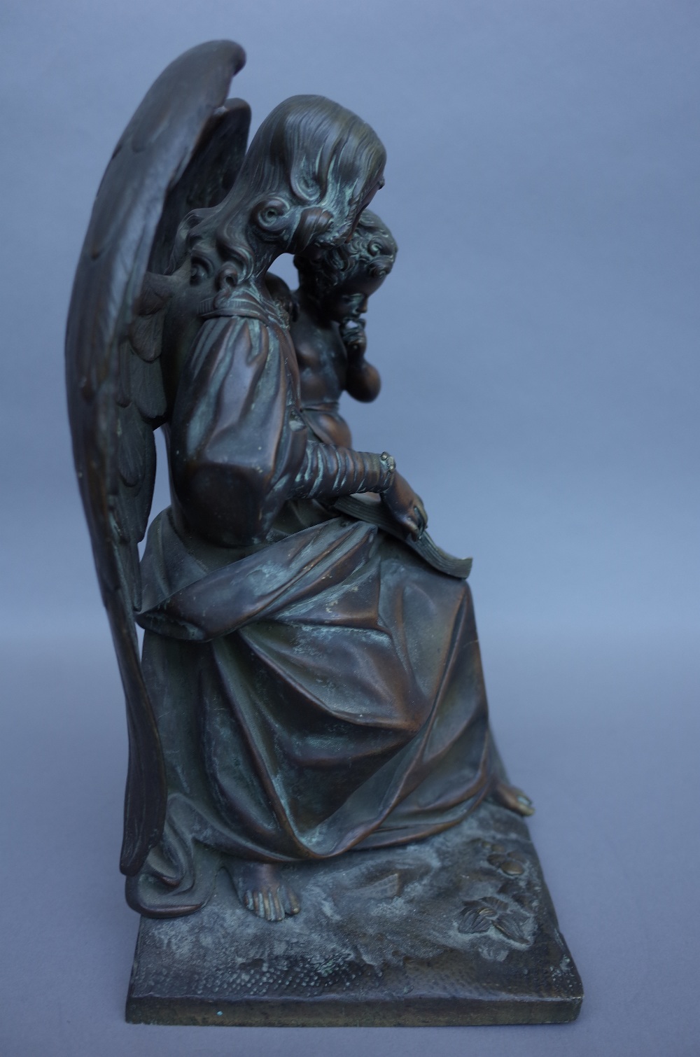 An early 20th century bronze figure group depicting The Archangel Gabriel with a putto on a - Image 2 of 2