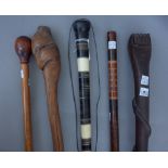 An African horn and bone mounted walking stick of segmented cylindrical tapering form (89cm),