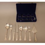 A King's pattern plated part table service, comprising; four table spoons, six soup spoons,