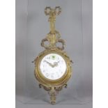 A French cartel clock in gilt metal case.