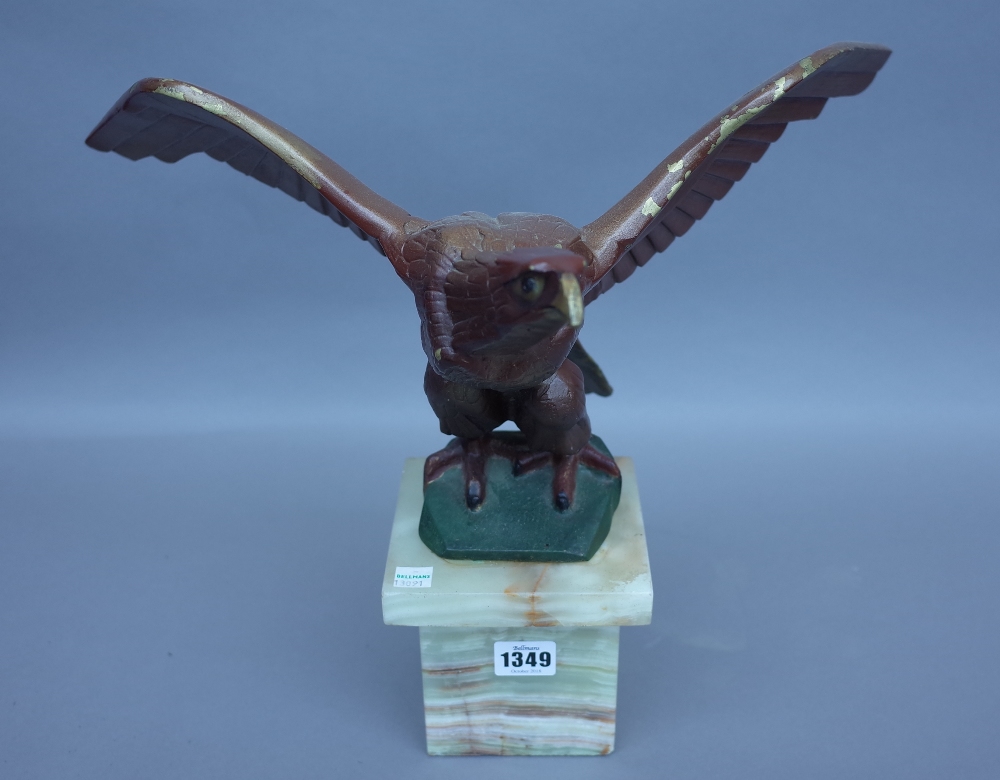 A polychrome painted bronze eagle, circa 1930, signed 'M. Decoux' on an onyx plinth, 35. - Image 2 of 3