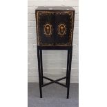 An early 19th century Chinese export black lacquer and gilt decorated table cabinet,